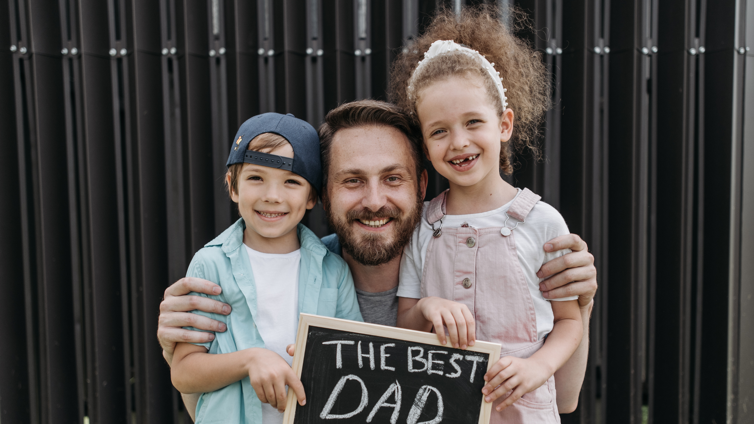 A father with his son and daughter