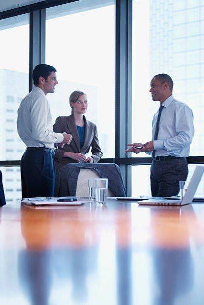 Corporate professionals collaborating in a meeting