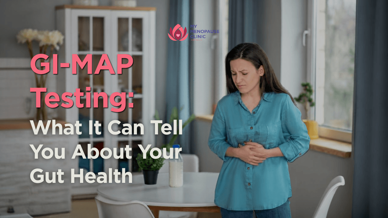 Woman holding her abdomen while experiencing digestive discomfort, representing common gut health concerns.