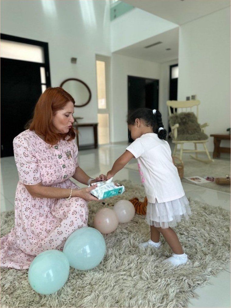 Lisa with a toddler at home, helping a family with potty learning