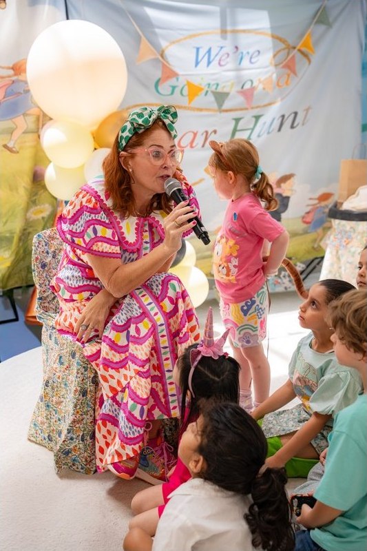 Principal Lisa hosting a Happy Families family event