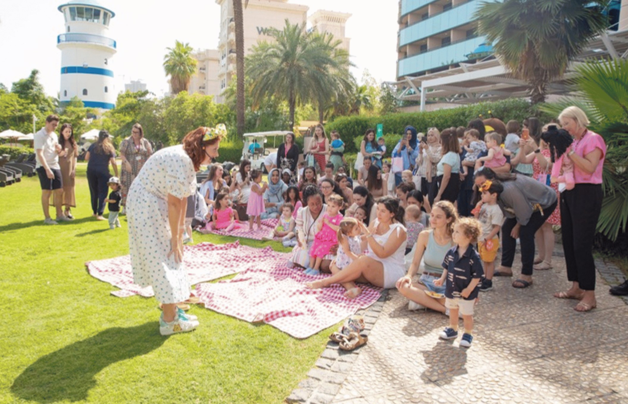 Families enjoying an outdoor picnic together