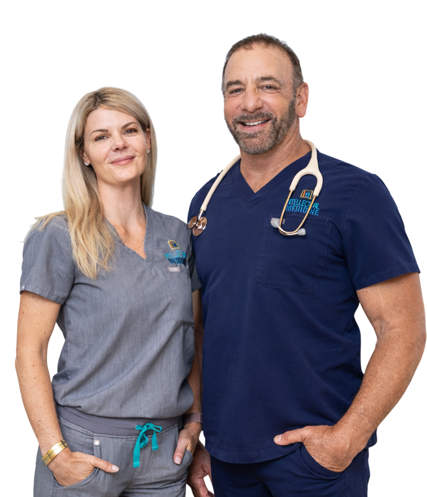 Dr. Petteruti and Shannon smiling. Dr. Petteruti is wearing a stethoscope.
