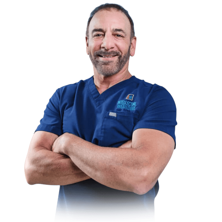 Dr. Petteruti with his hands folded smiling