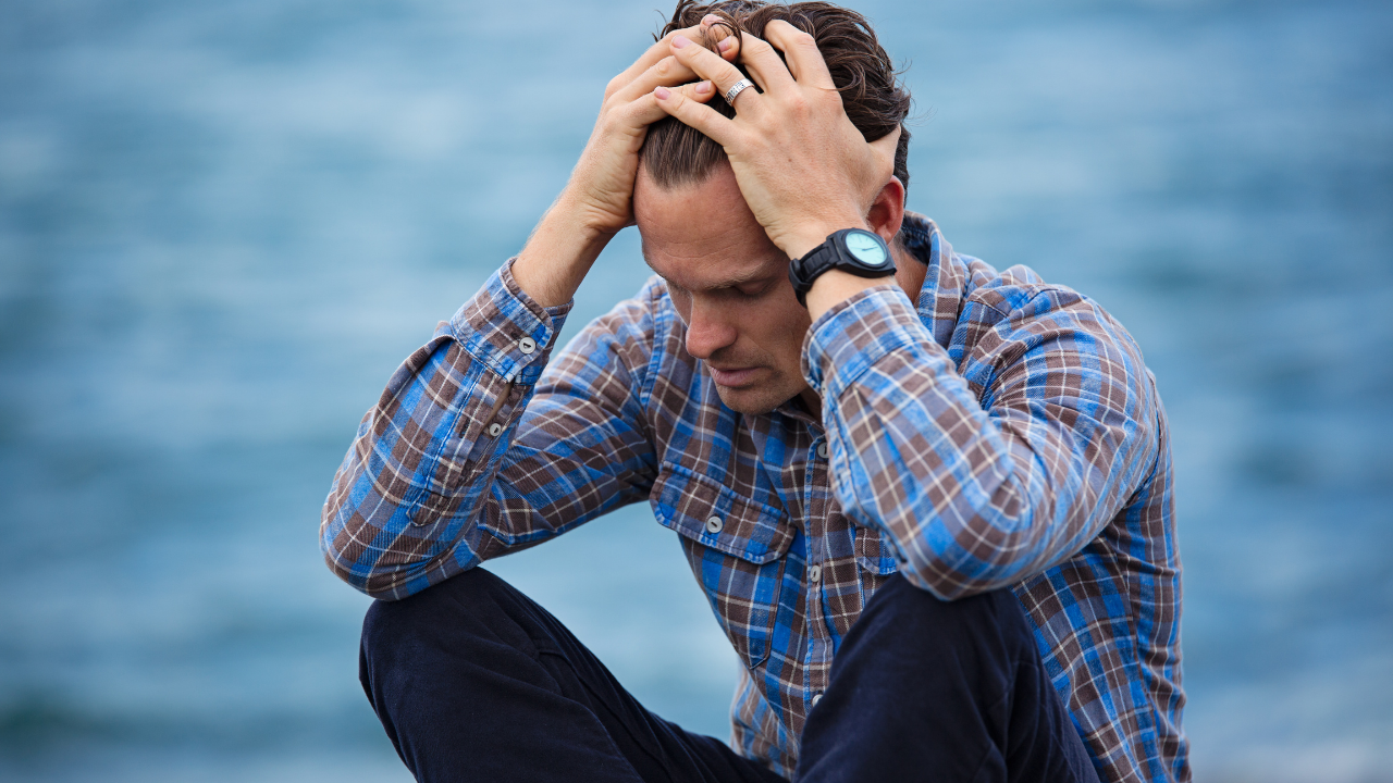 Man experiencing stress and emotional fatigue associated with androgen deprivation therapy for prostate cancer