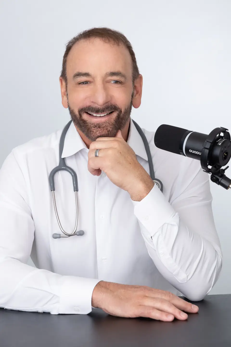 Dr. Stephen Petteruti recording his podcast.