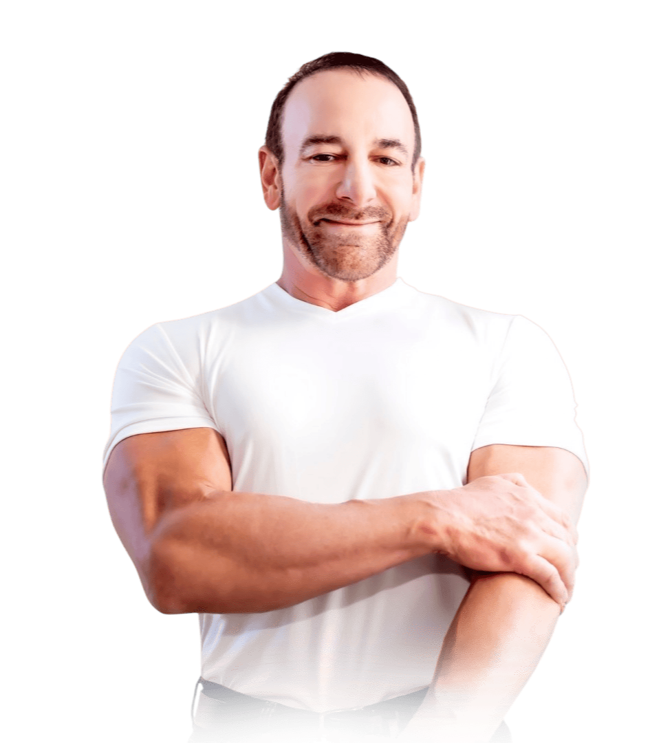 Dr. Stephen Petteruti standing in a white t-shirt with one hand folded