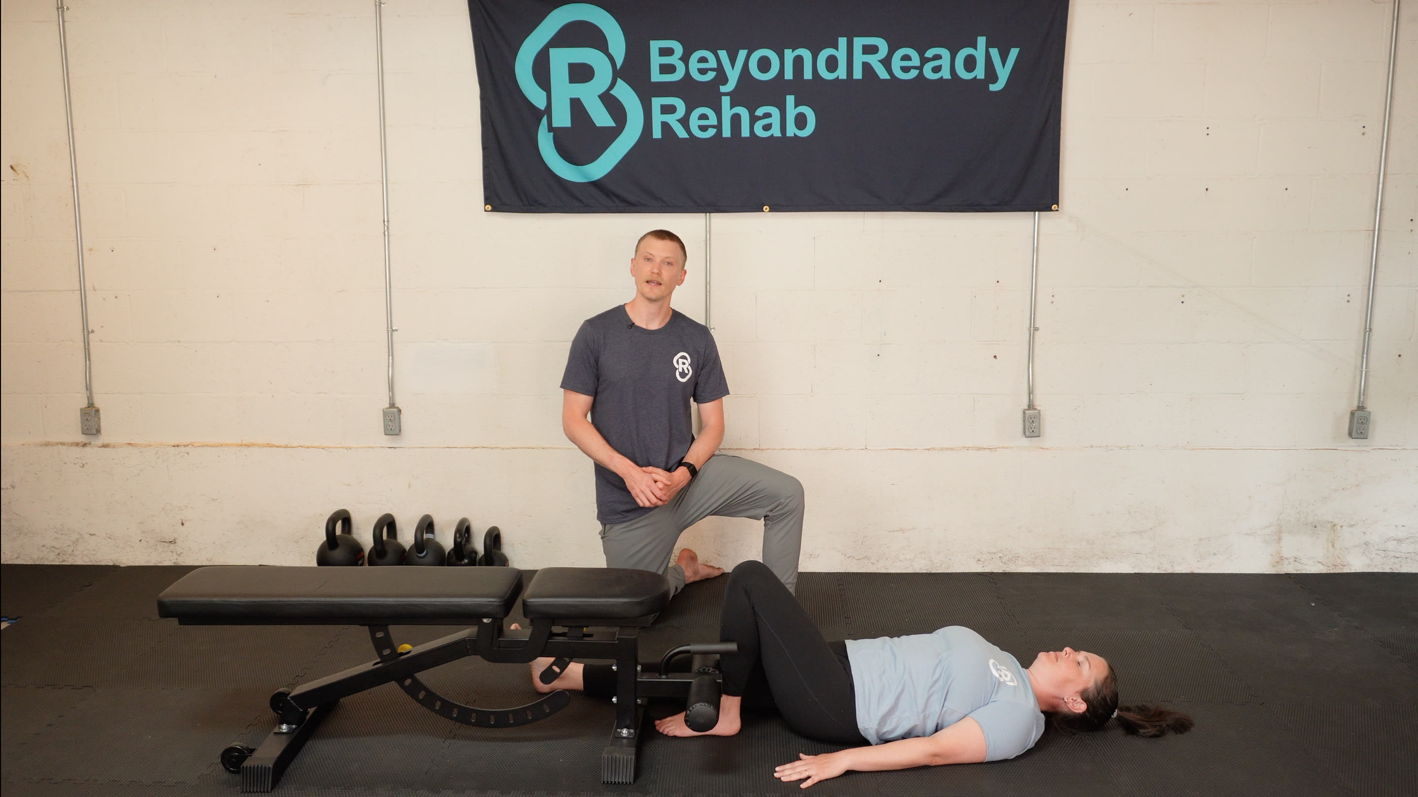 Camden hands-on coaching a supported knee flexion drill