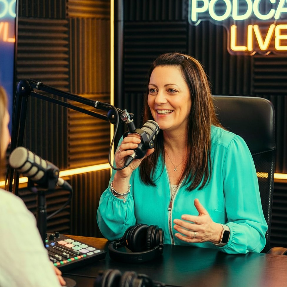 Rachel Flower, founder of PowerVox, speaking into a microphone in a podcast studio