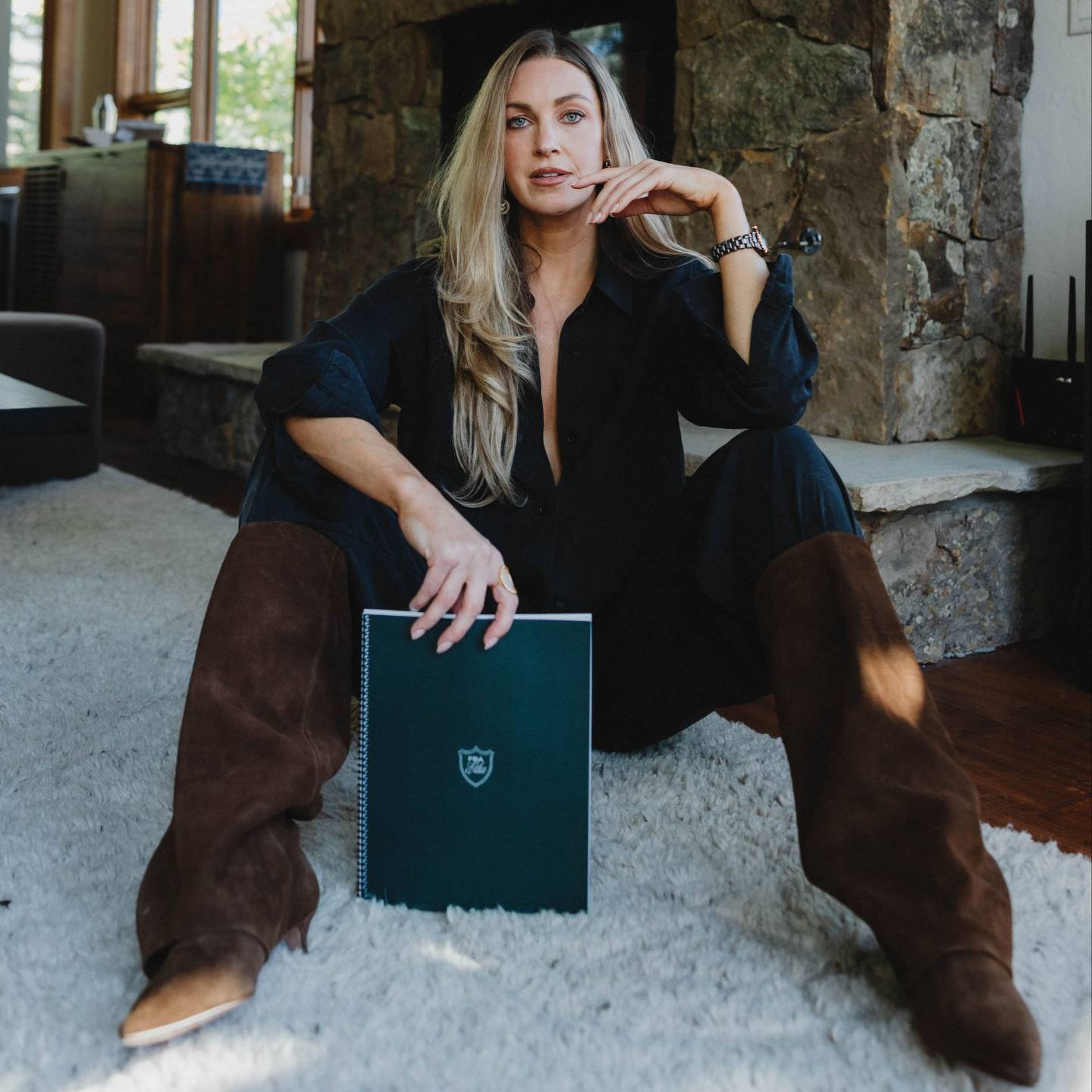 Fin holding The Founder's Journal