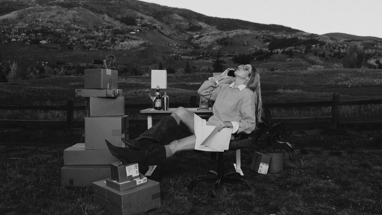 Fin surrounded by boxes and research