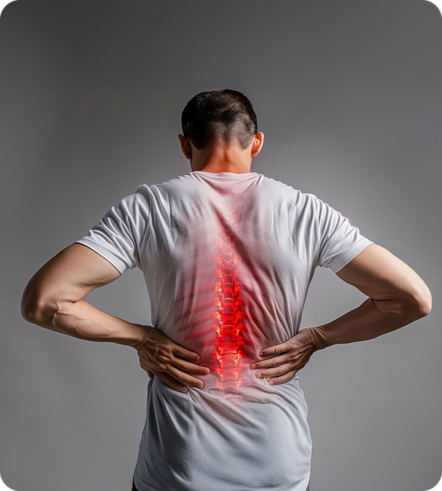 Person holding lower back in pain