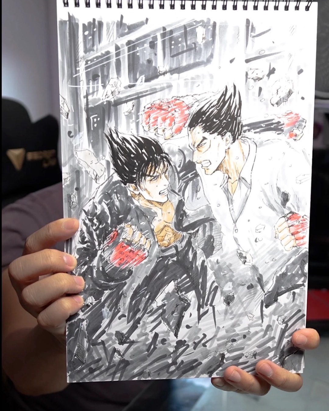 Encrage de deux personnages en pleine action, marqueurs noir et rouge