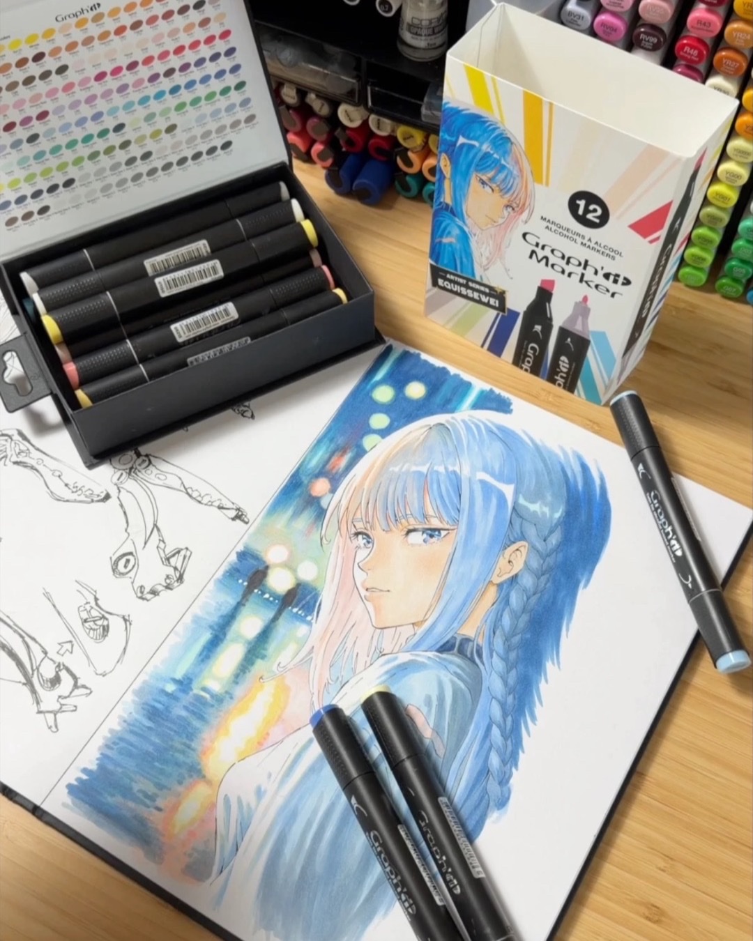 Boîte de marqueurs Graph’it « Artist Series » à son nom, avec une illustration