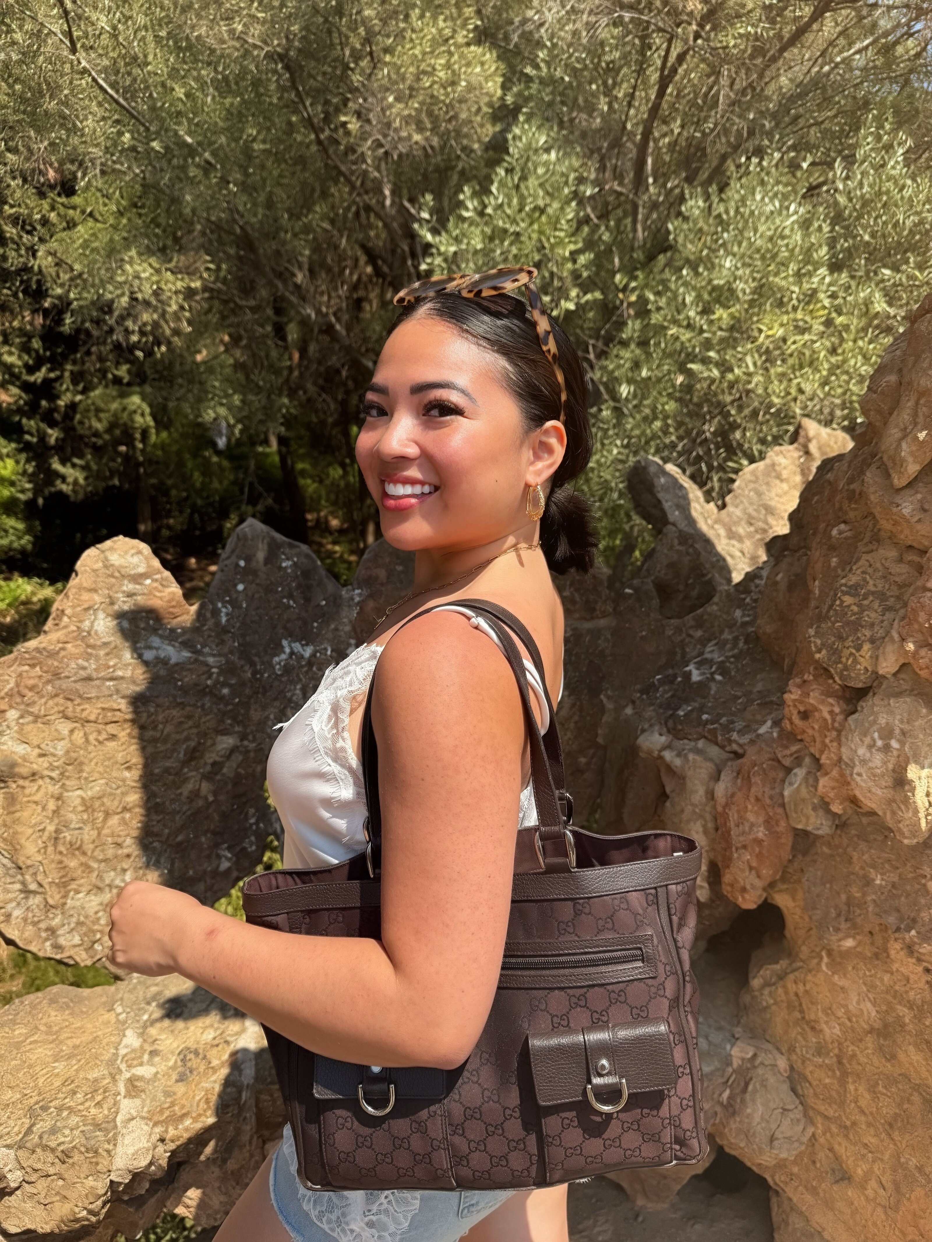 Megan outdoors with her bag