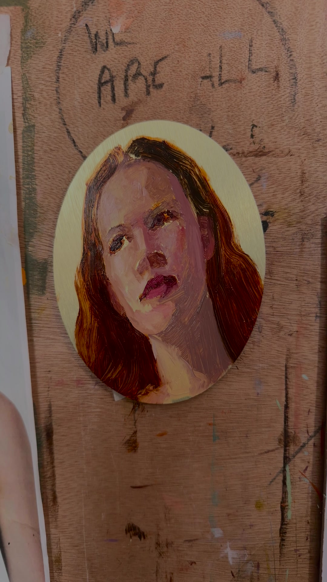 The portrait on aluminium with the first opaque layer and the hair painted in