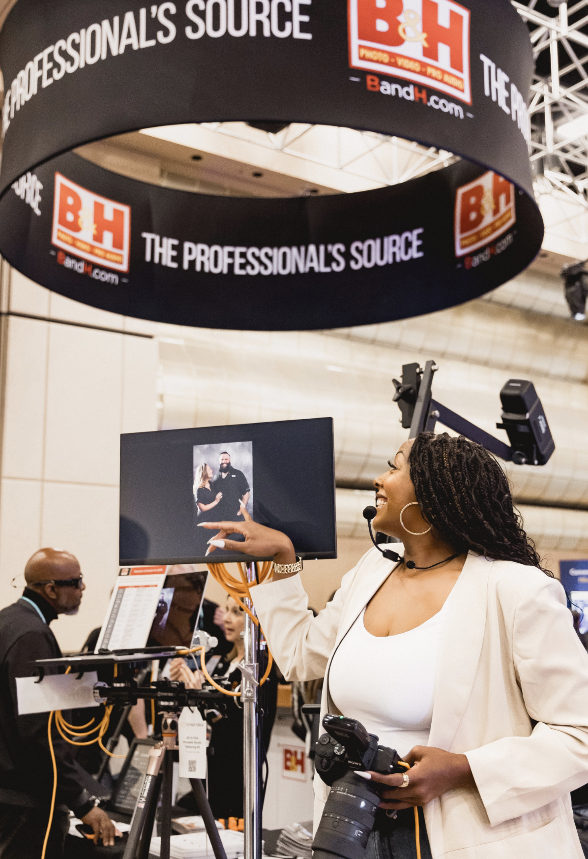 Michelle Harris presenting at the B and H stage at WPPI