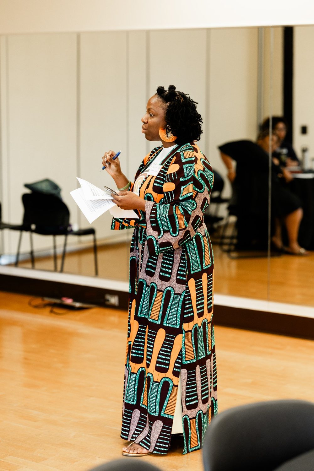 Danielle Izaak-Lewis speaking at an event