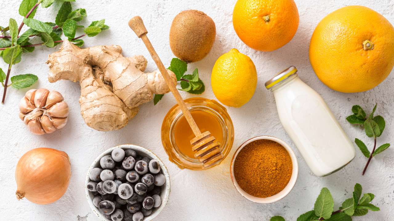 Child in winter clothing with healthy foods and holiday treats illustrating a balanced approach to kids’ winter immune health