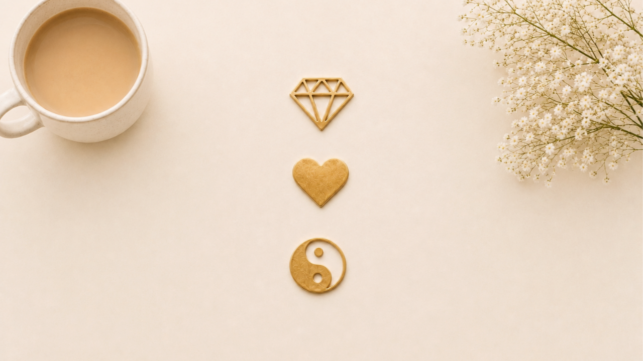 Gold diamond, heart, and yin and yang symbol