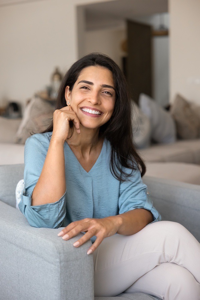 A confident woman smiling