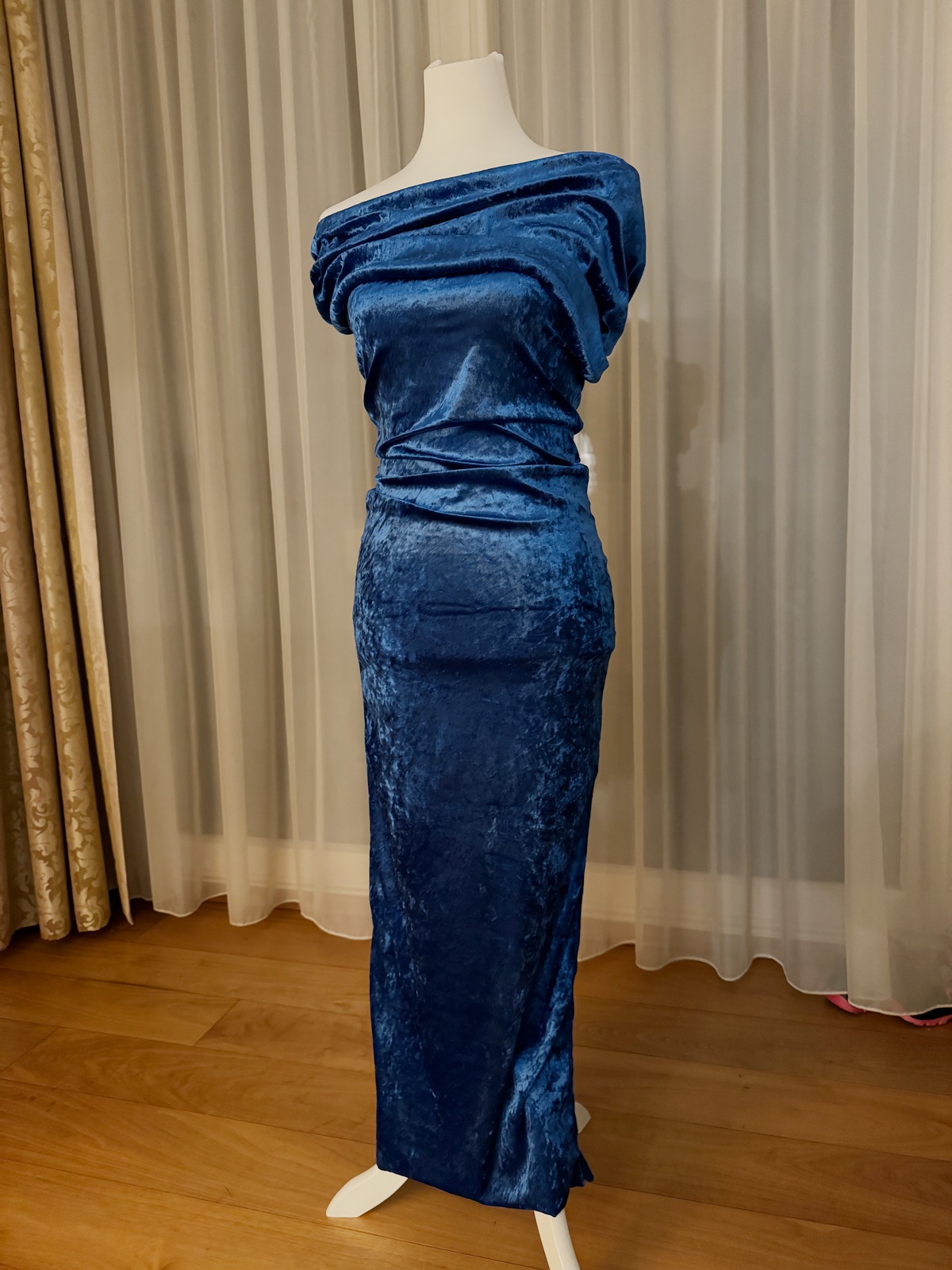 Self-sewn velvet dress on the dress form