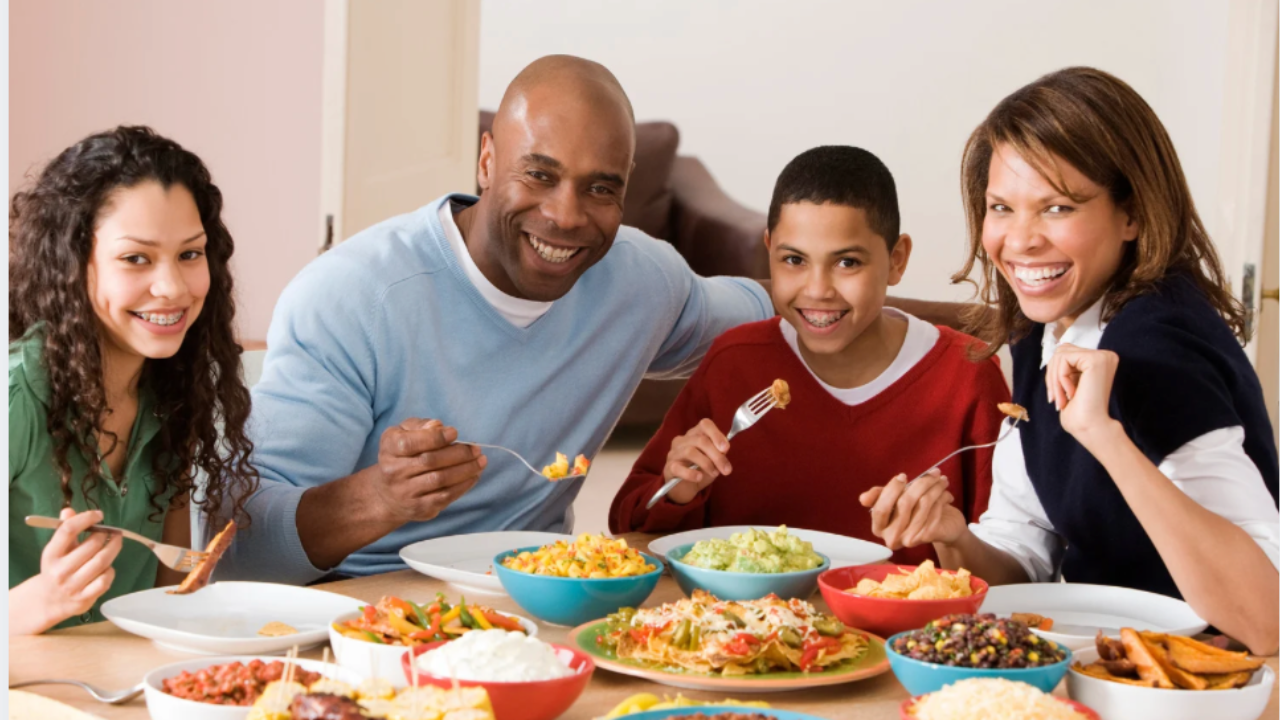 A family sharing a genuine connected moment representing the pressure culture coaching approach of redefining success around individual strengths and real life wellbeing.