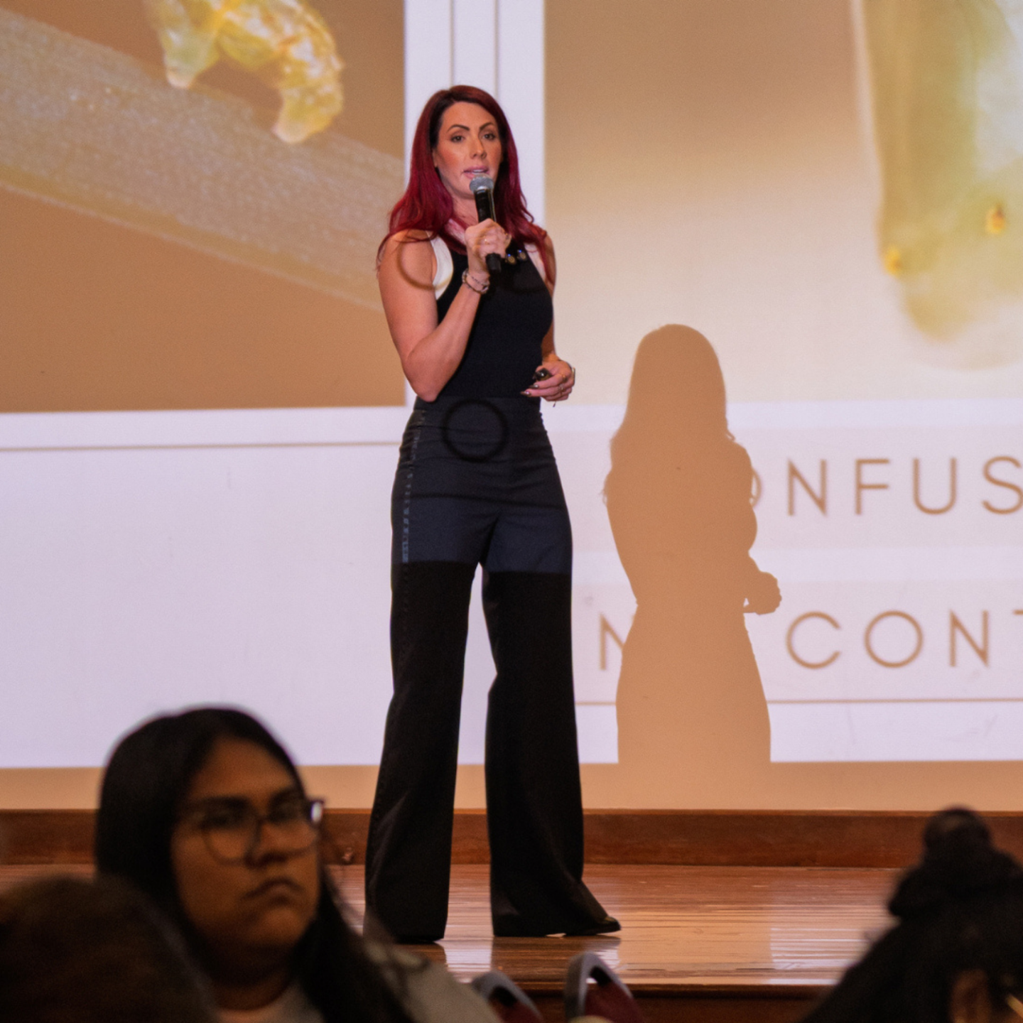 Meg Ellis speaking at a corporate or live event