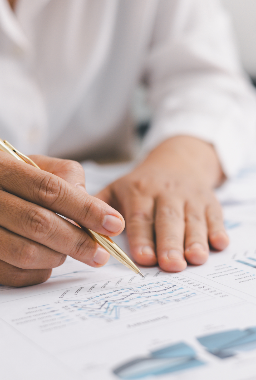 Group of professionals in a finance meeting discussing sustainability reporting