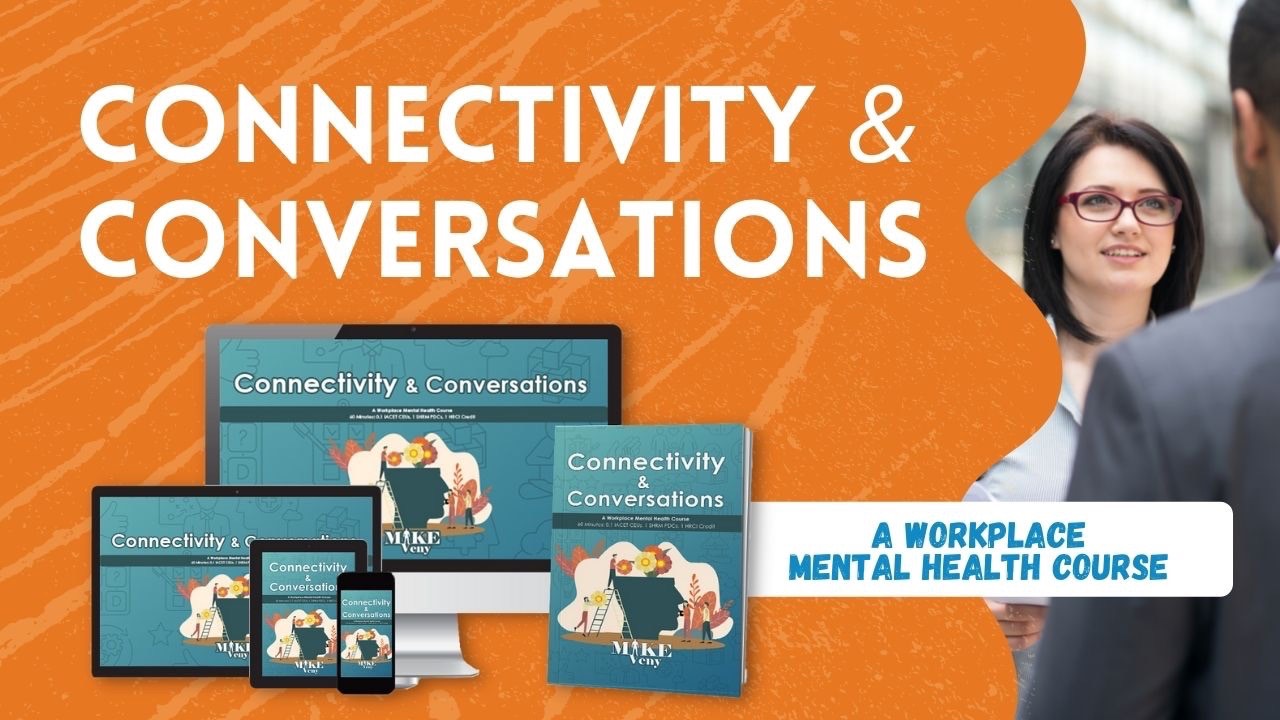 Promotional graphic for “Connectivity & Conversations,” a workplace mental health course by Mike Veny. The left side features a bold orange textured background with large white text reading “CONNECTIVITY & CONVERSATIONS.” Below the title are course materials displayed across multiple devices, including a desktop computer, laptop, tablet, and smartphone, along with a matching course workbook or book cover. On the right side, a blurred workplace conversation shows a woman wearing glasses speaking with a man in a suit. A white label near the bottom right reads “A WORKPLACE MENTAL HEALTH COURSE” in blue text. The image communicates professional development, workplace mental health training, emotional wellness, communication, and employee support.