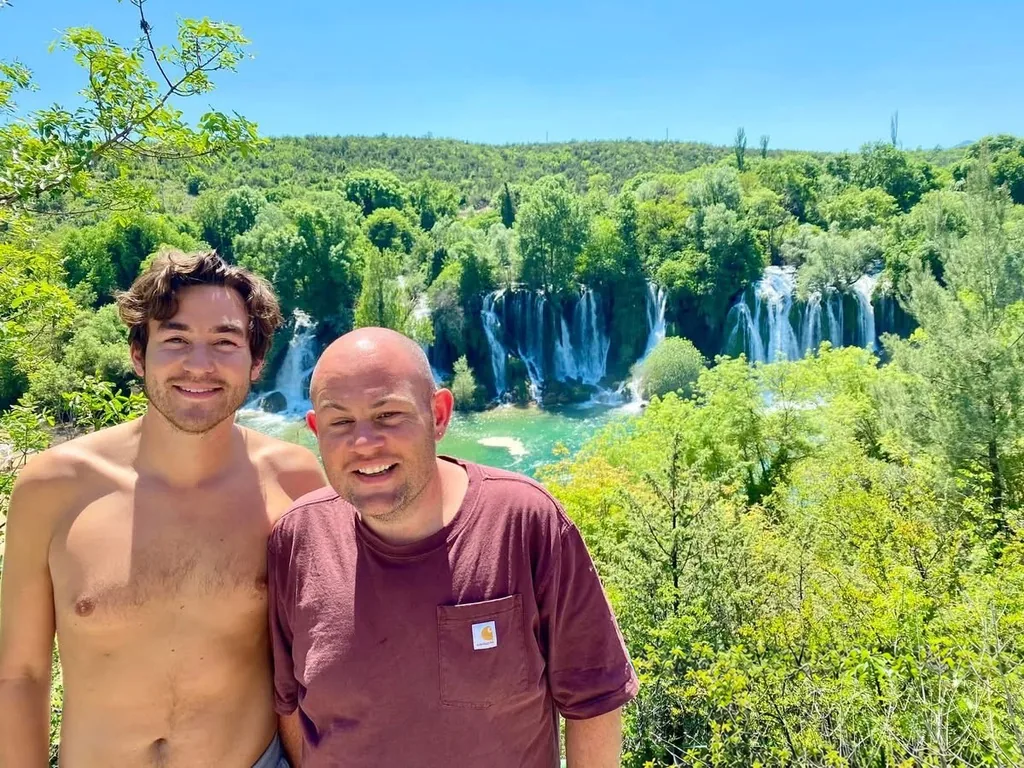 Spencer on the left and Sam on the right at waterfalls in Bosnia and Herzegovina