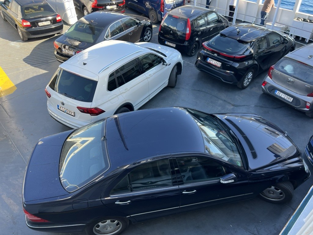 Our blue Mercedes-Benz S-320 CDI aboard a ferry on a European road trip