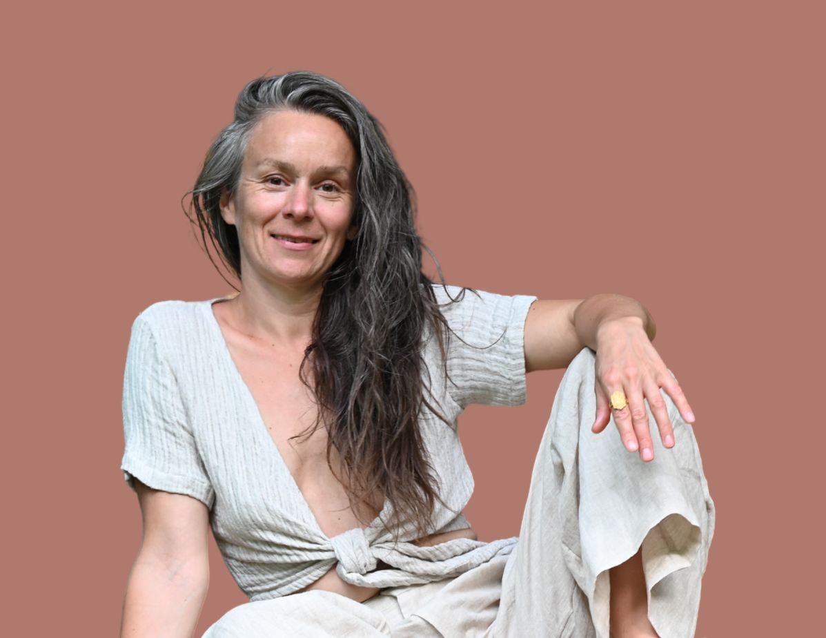 Professional portrait of Laurence Tison, Somatic Educator and Erotic Sovereignty Mentor, inviting high-achieving women to connect and begin their somatic journey home to their embodied selves.