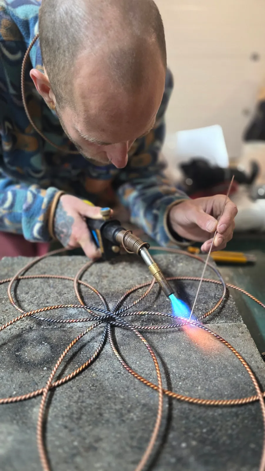 Joining twisted copper into a flower of life with a torch