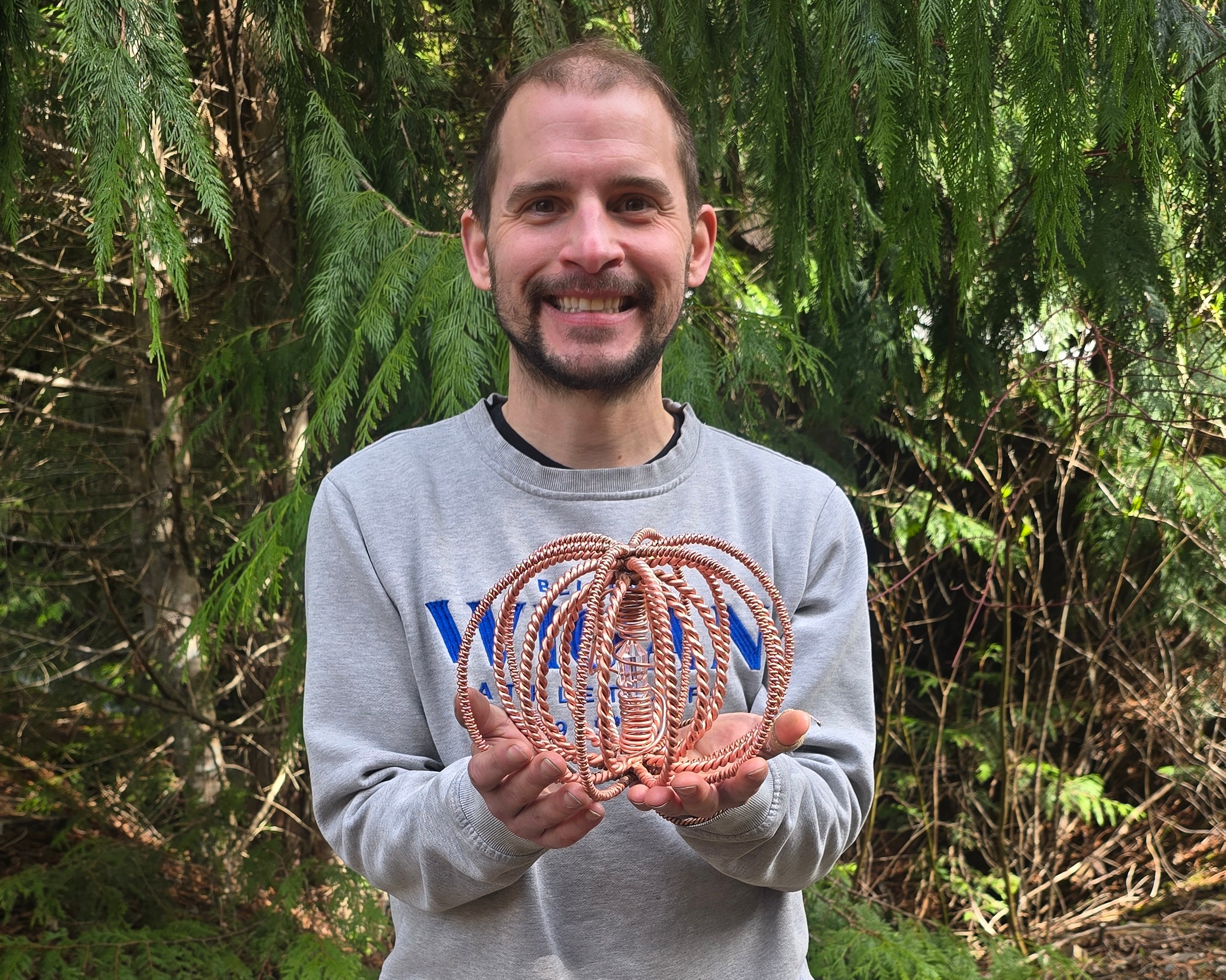 Spence Madden holding an Agricultural Harmonizer Antenna