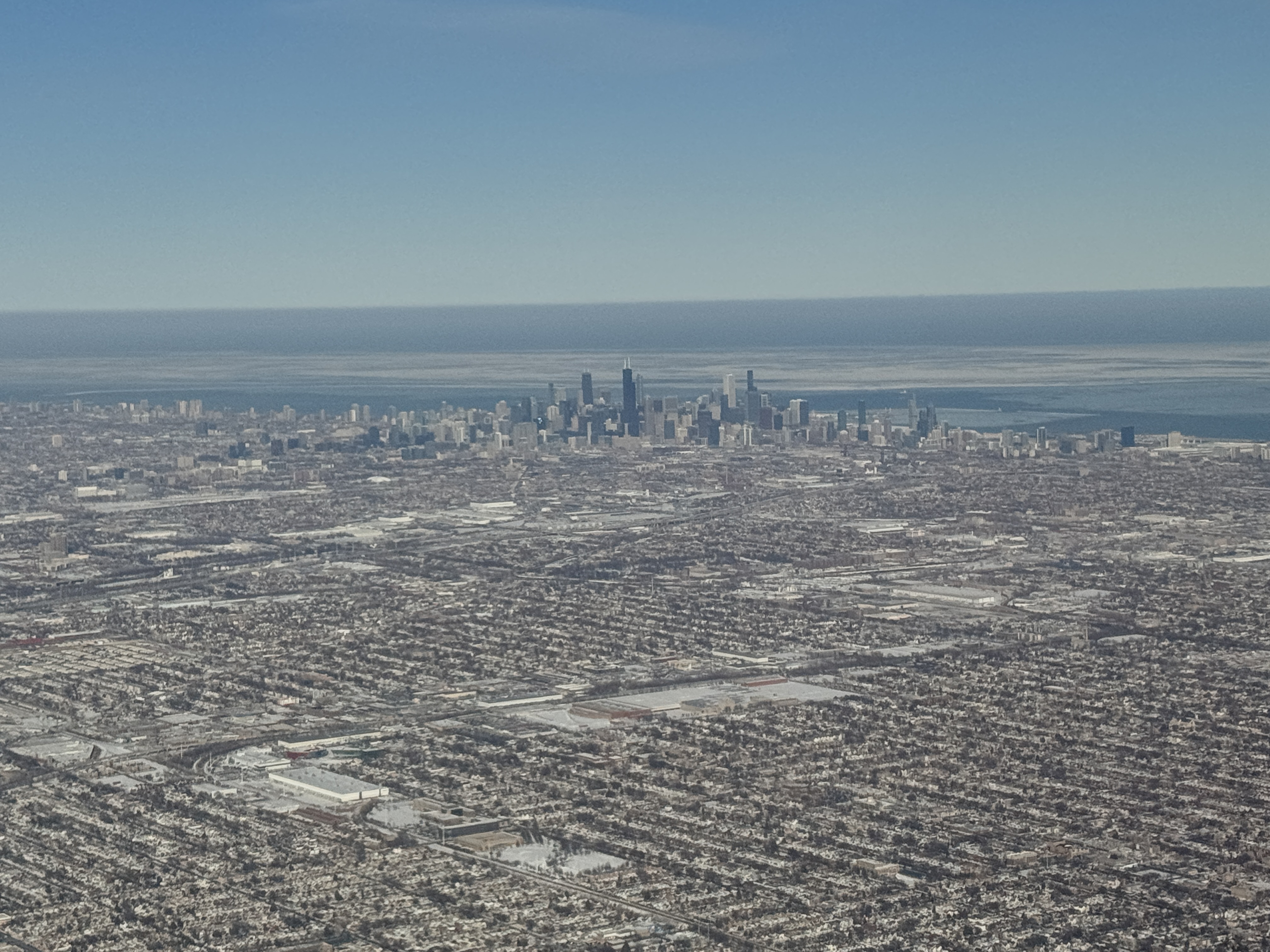 An airplane view from Chicago, viewing from the southwest side of downtown
