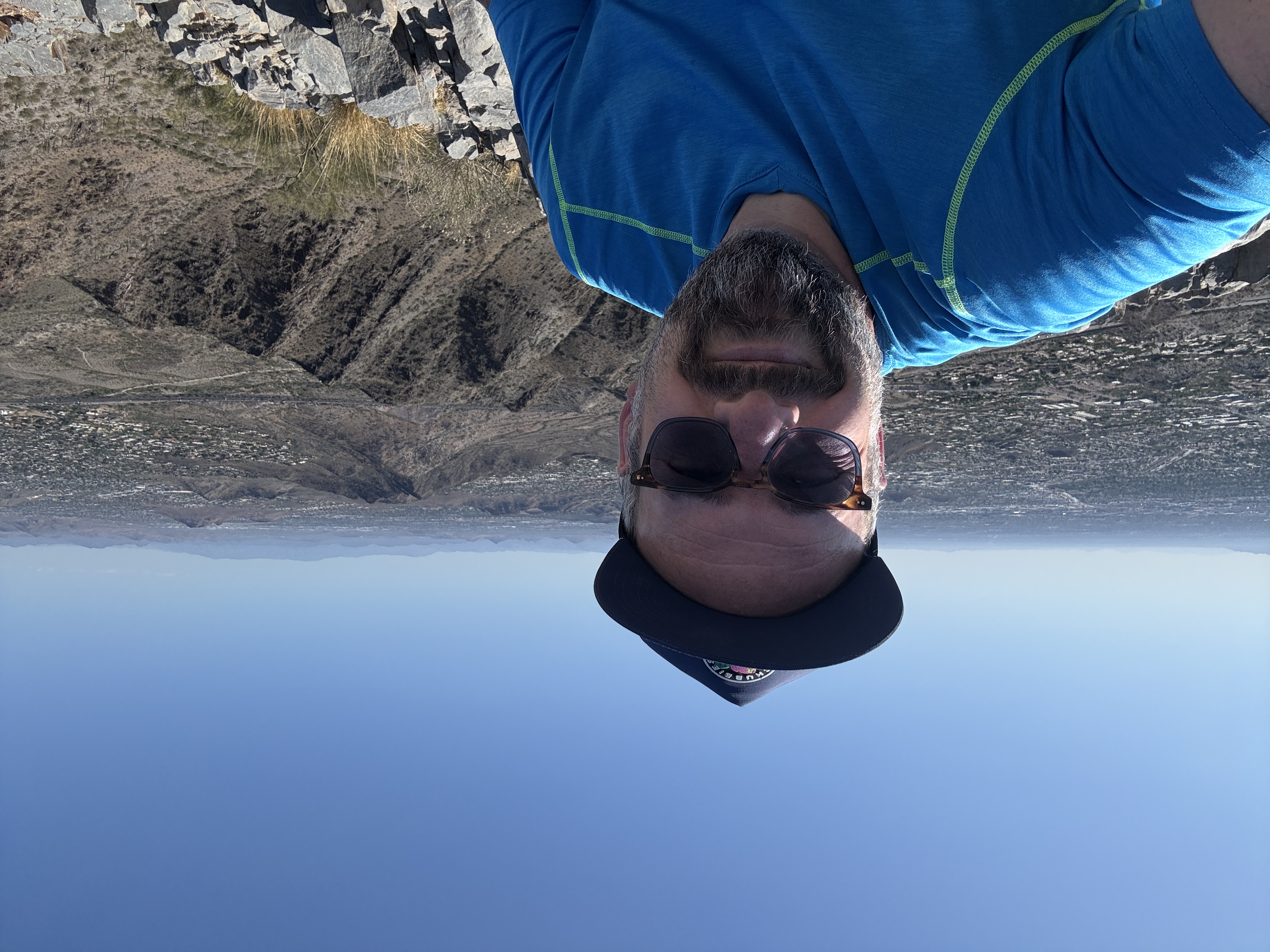 Scott, the writer of the Friday Job Report sitting on top of Piestewa Peak in Phoenix