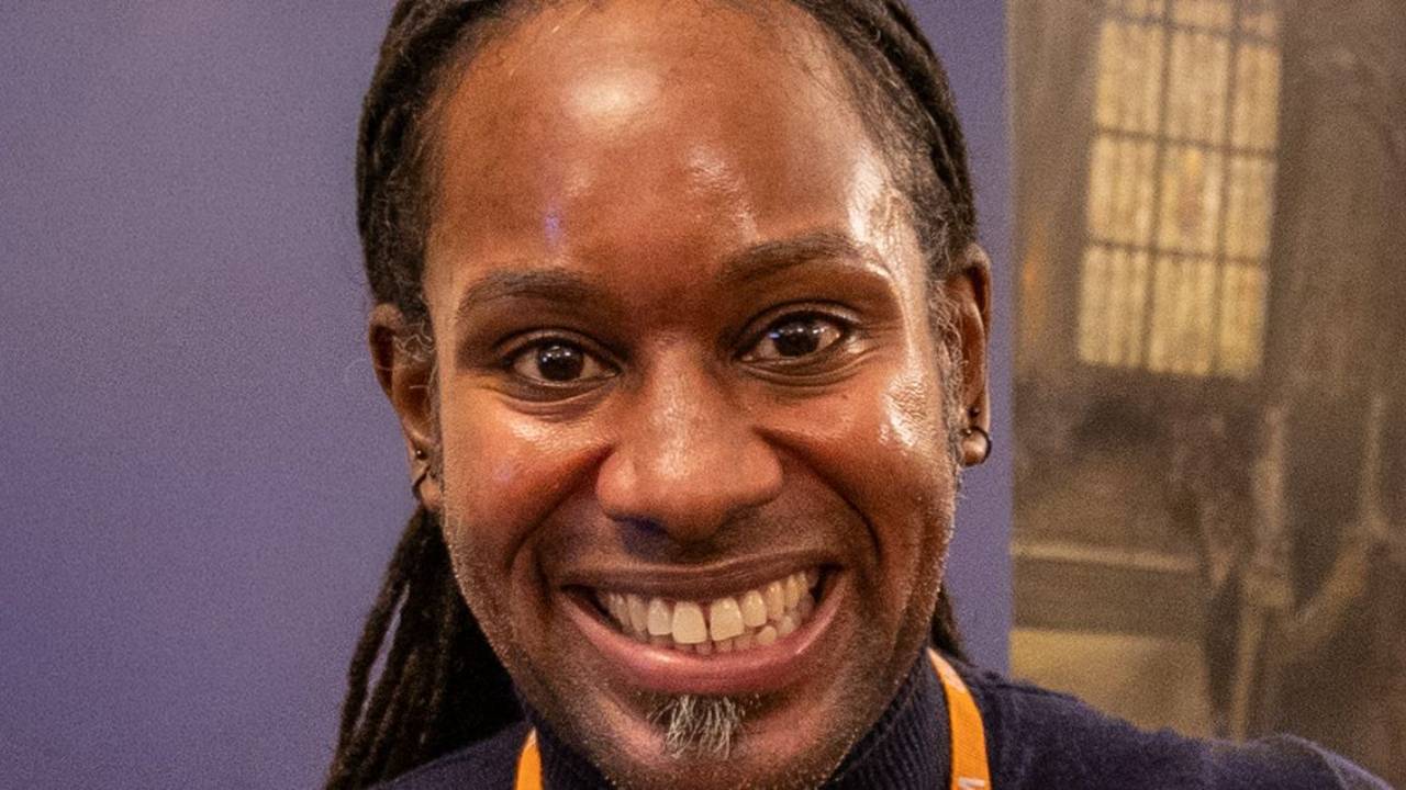 Image of Jason Ardy - a black man smiling with dreadlocks
