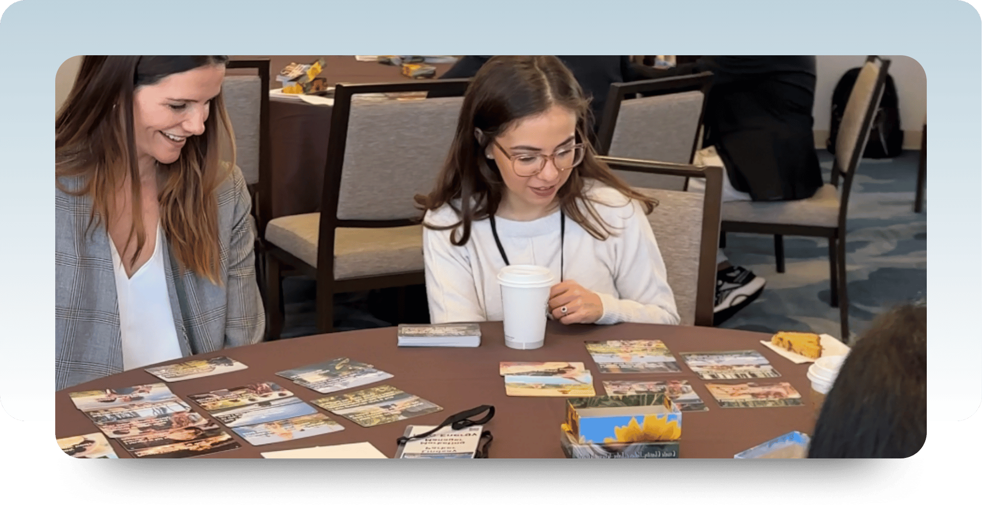 Two photos from Center for Talent Solutions workshops: one of a group of women reviewing TALENT Drivers cards at a conference table, and one of two women sorting LIFEDrivers cards at a round table, reflecting the shift from TALENT Drivers to LIFEDrivers