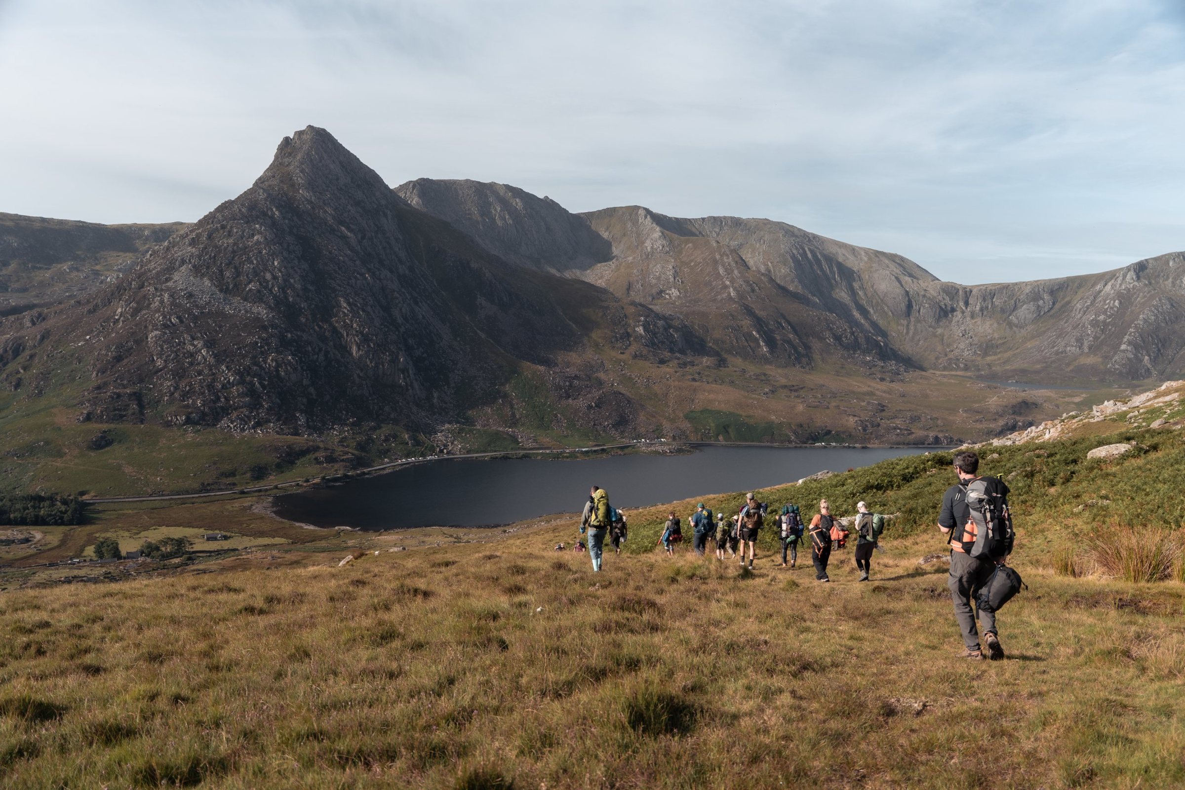 Men walking towards Tryfan in Wales