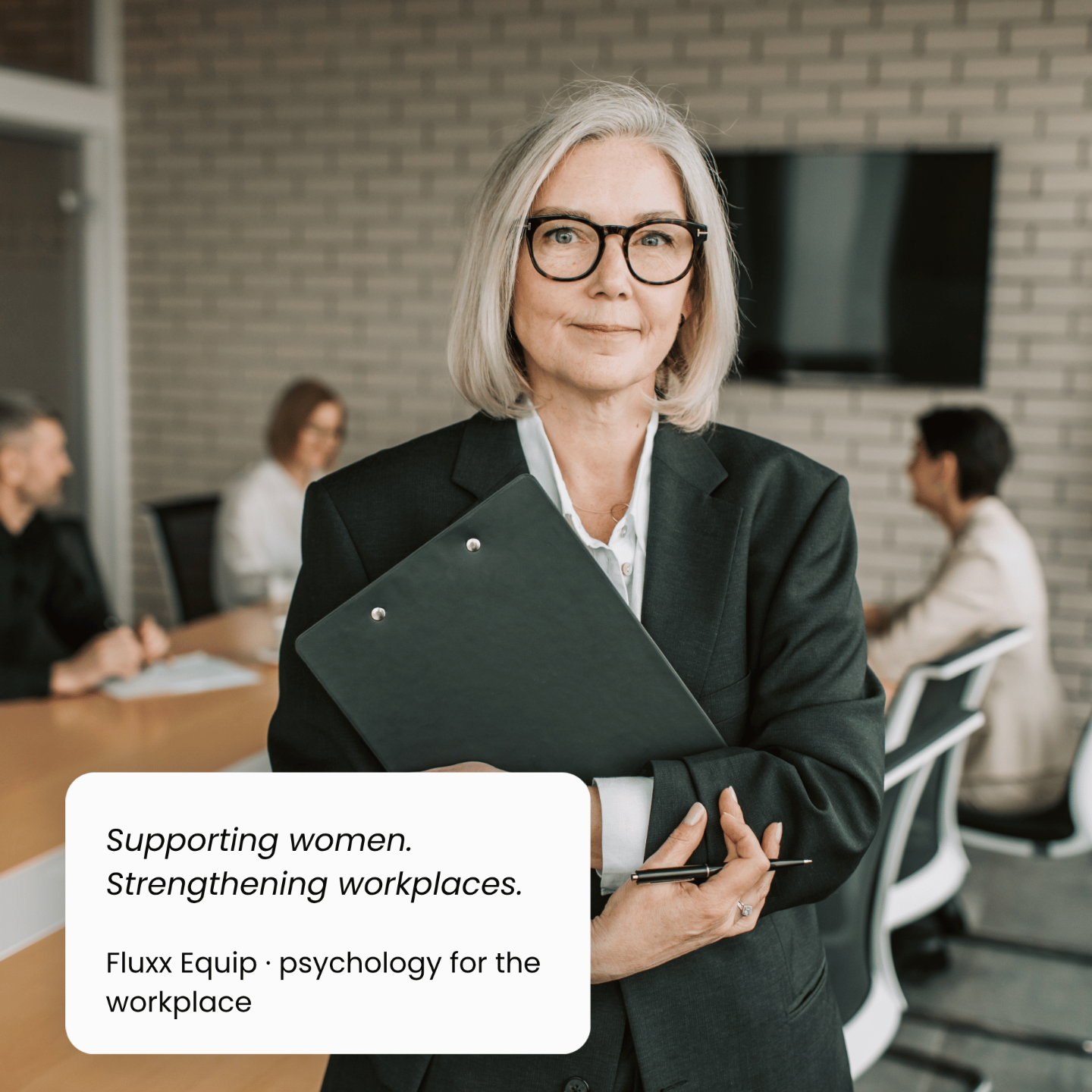 Midlife woman in the workplace, representing support for women through perimenopause at work