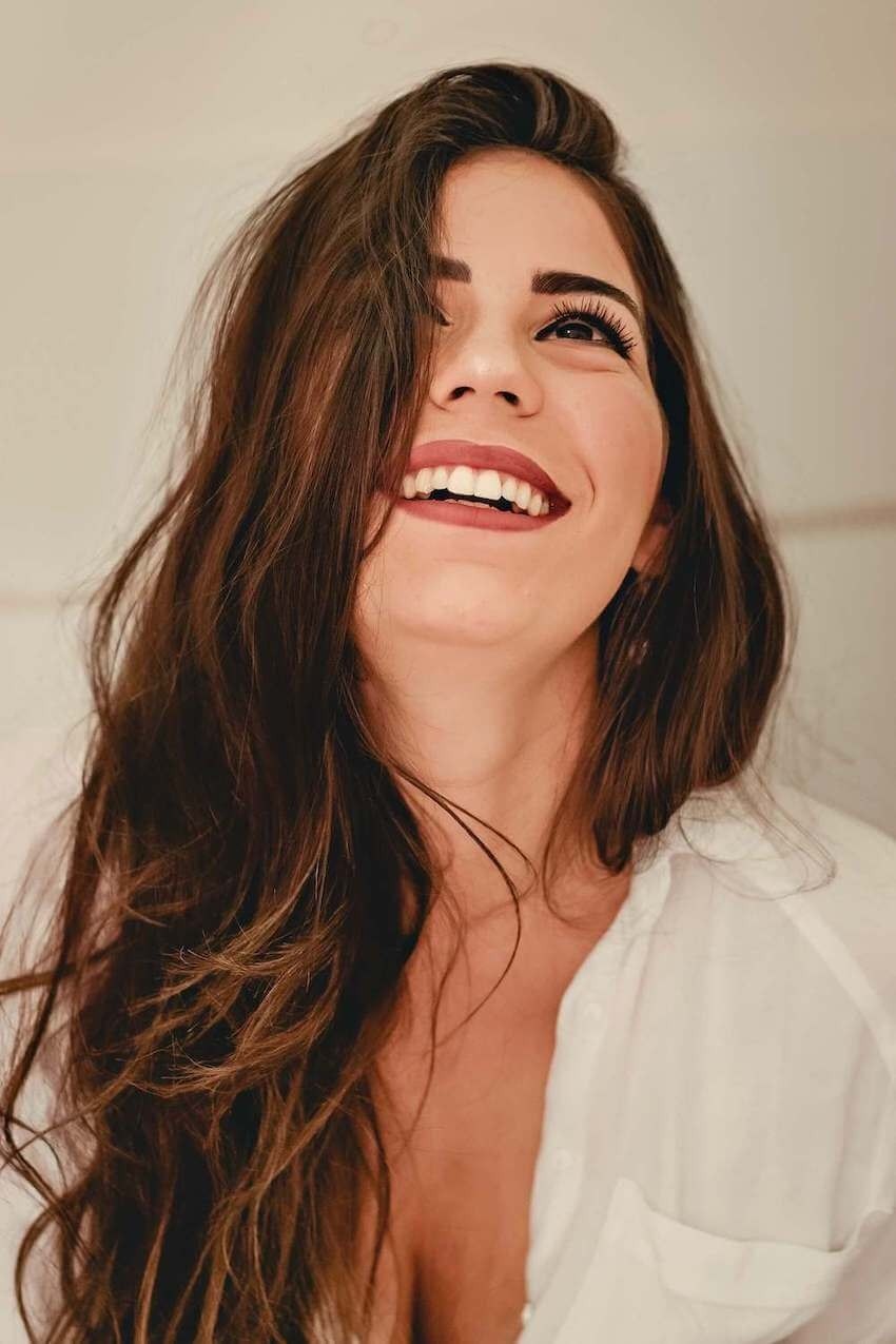 happy brunette woman smiling