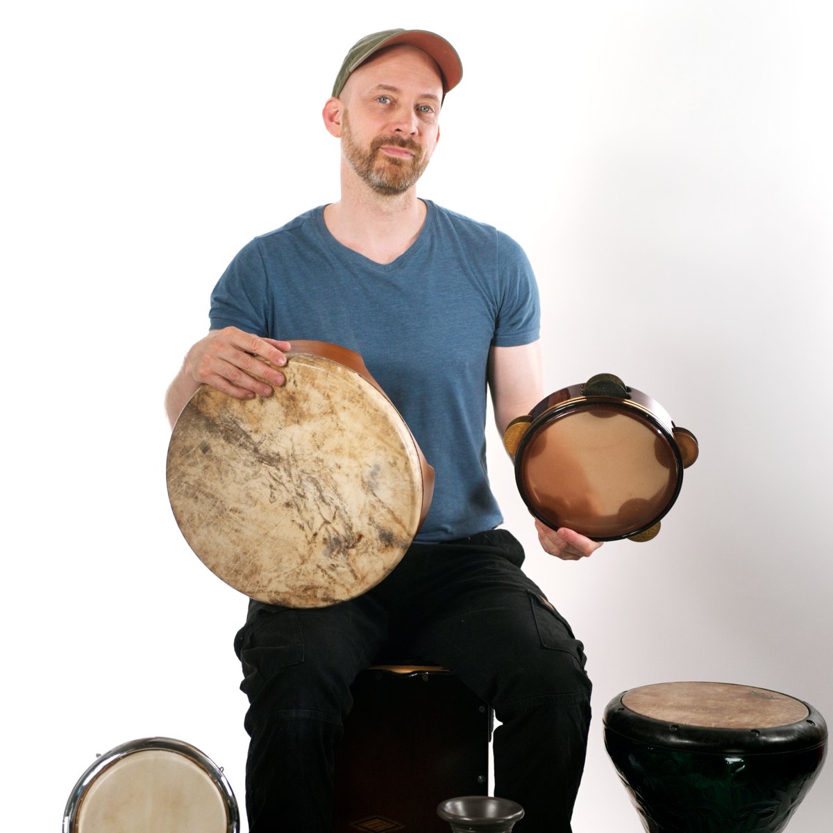 David Kuckhermann with frame drum, tambourine, udu and congas
