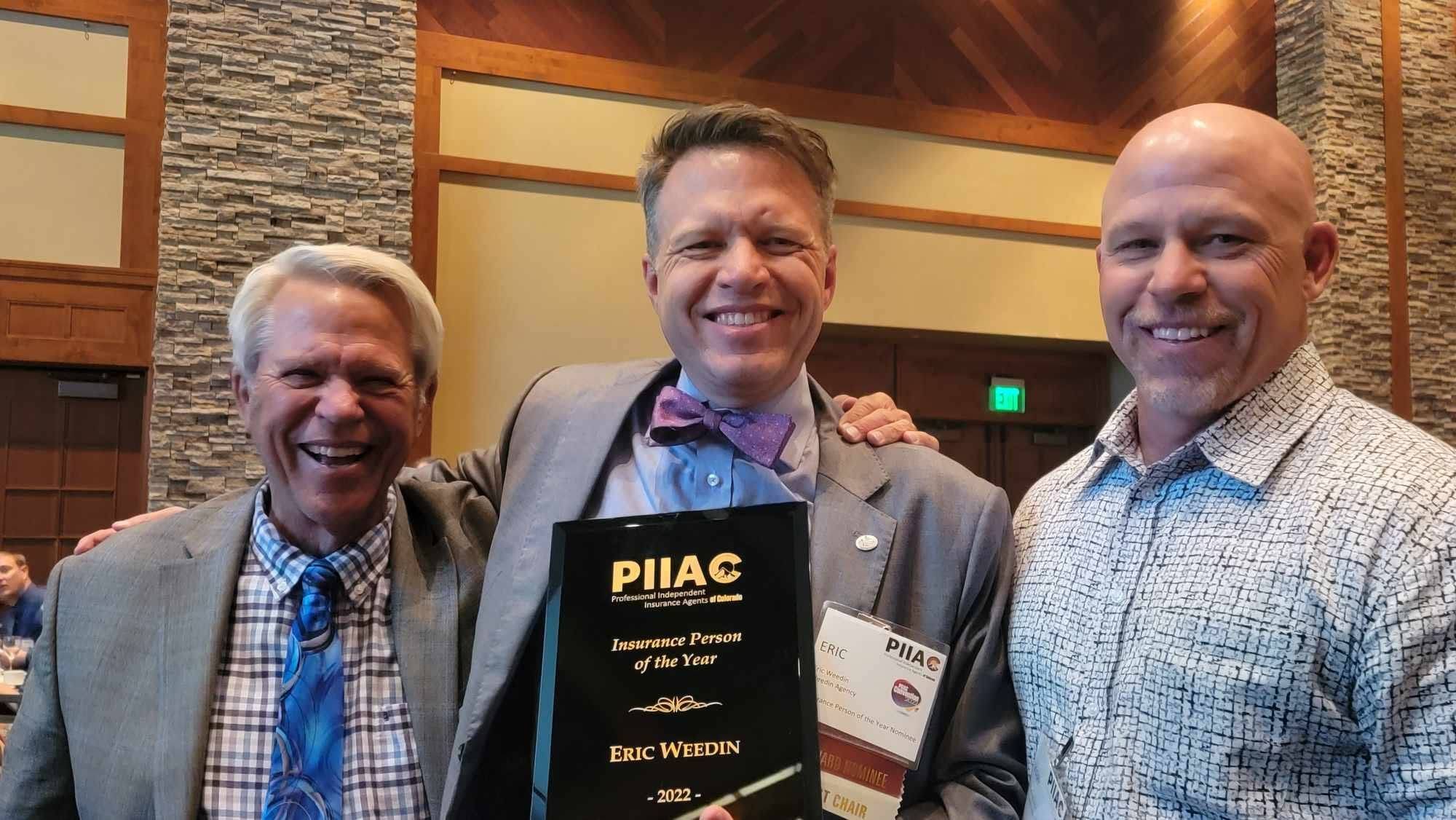 Eric Weedin receiving the 2022 Colorado Insurance Person of the Year award