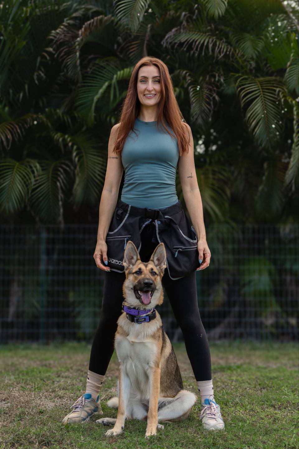Savanah standing with her German Shepherd
