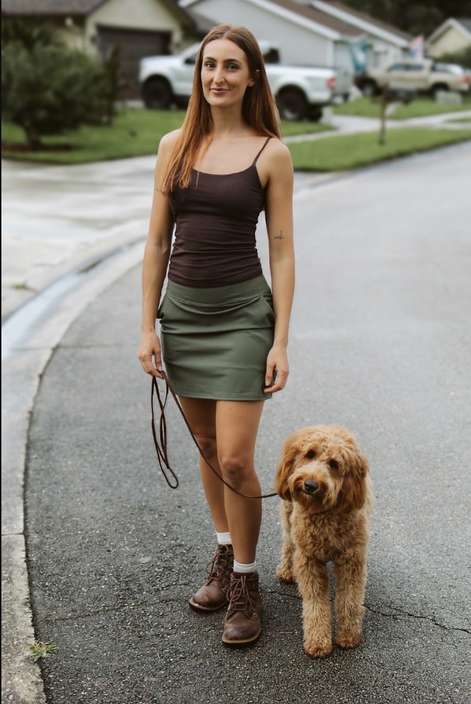 Savanah with one of the dogs she trains