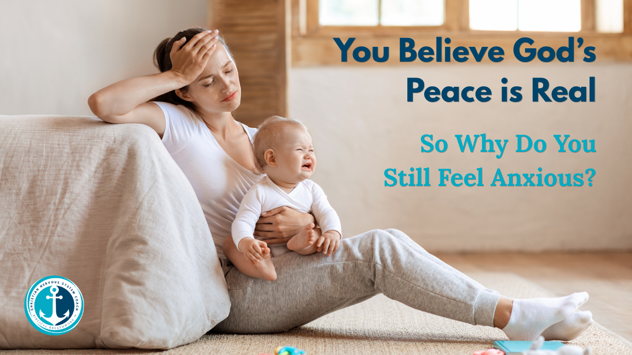 An exhausted Christian mom sitting on the floor holding a crying baby, representing the gap between believing God's peace and feeling it in your body.
