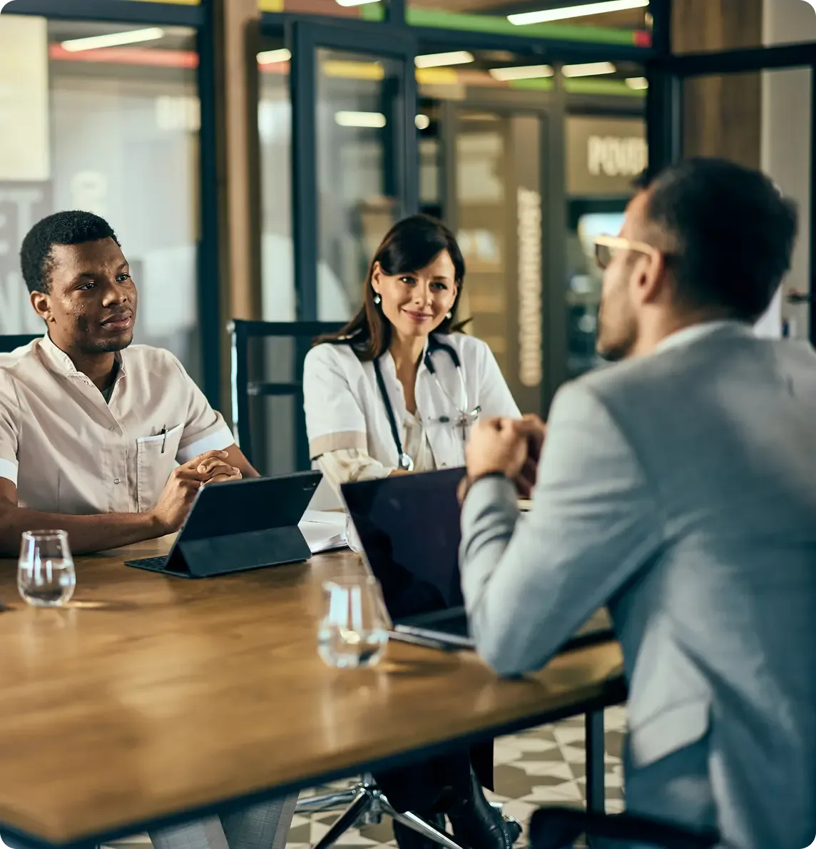Employer leadership team reviewing healthcare funding options