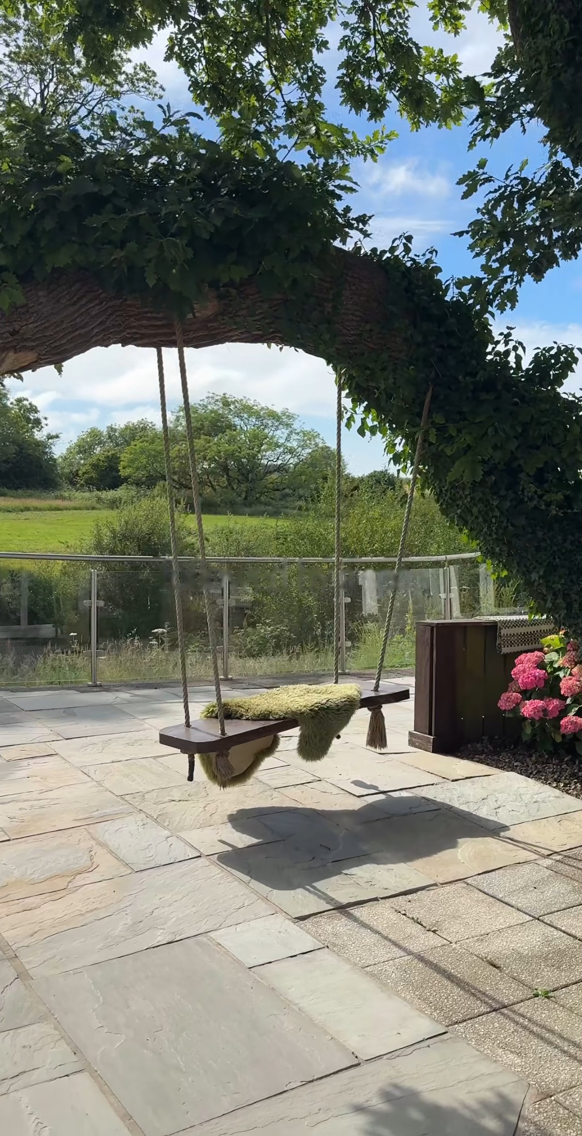 The swing under the oak tree at Gower Retreats