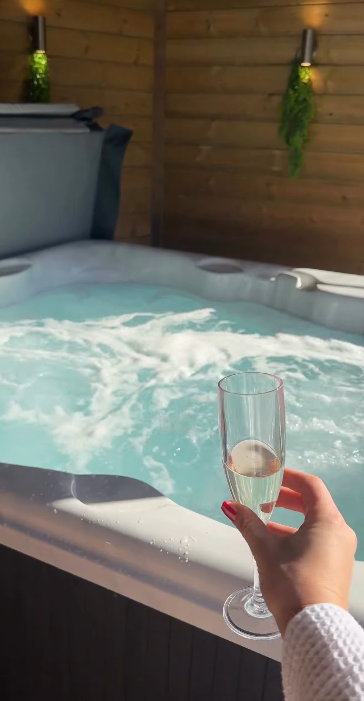 Hot tub with a glass of prosecco